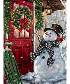 Cuadro Muñeco de Nieve Manualidad de Pedrería: escena navideña con muñeco de nieve junto a una puerta roja decorada con corona y luces.